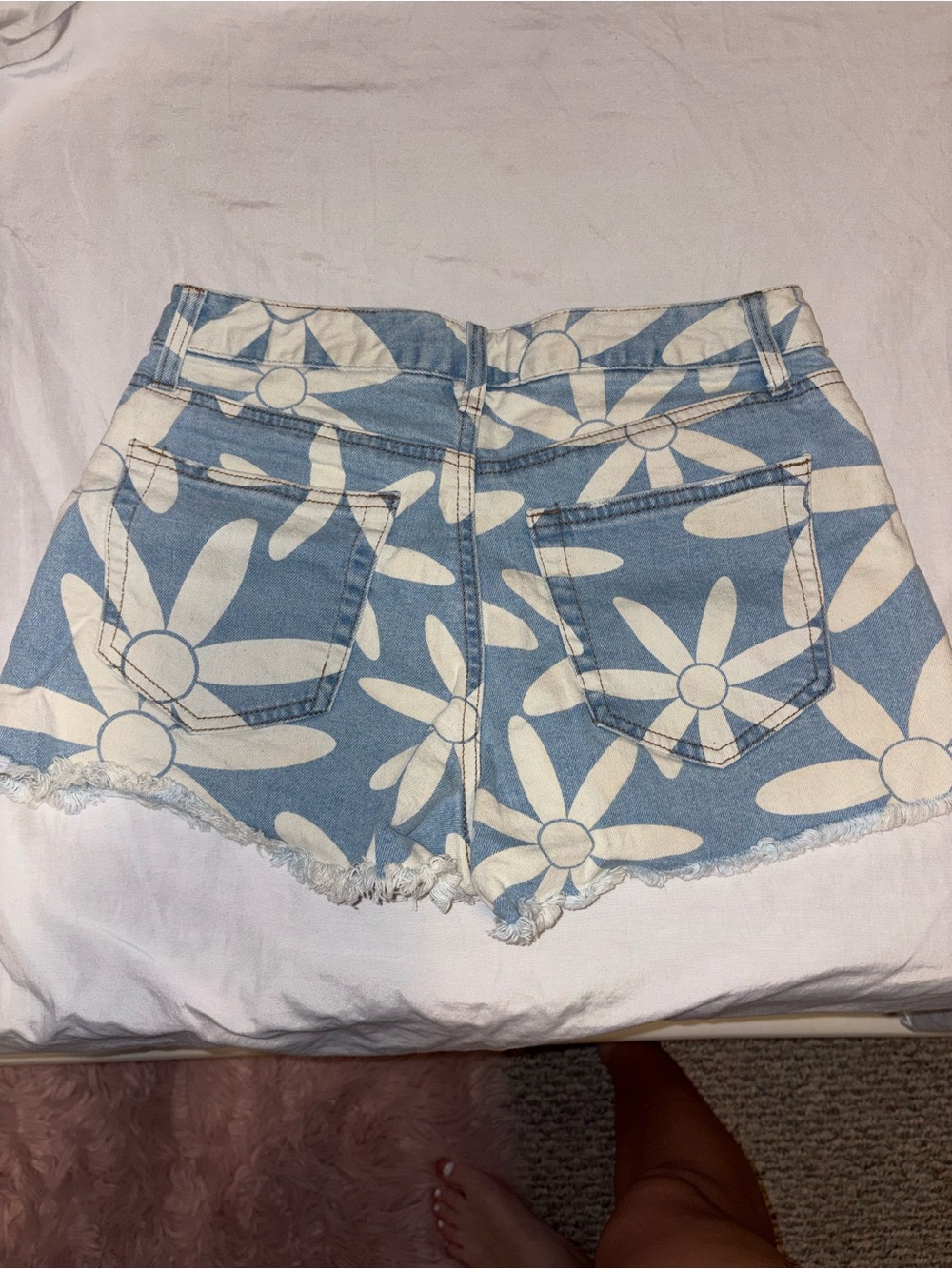 Light Blue Daisy Print Denim Shorts with Frayed Hem